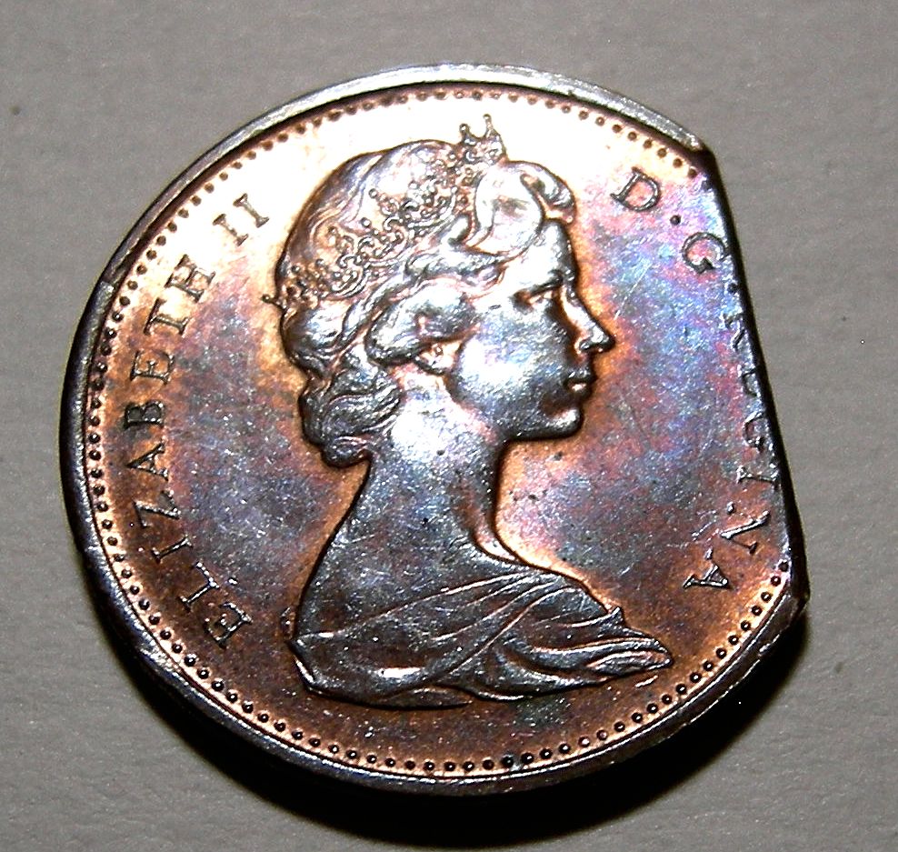 What-Could-Cause-Extreme-Shades-Of-Aqua-Blue-And-Violet-On-George-VI--Cent?