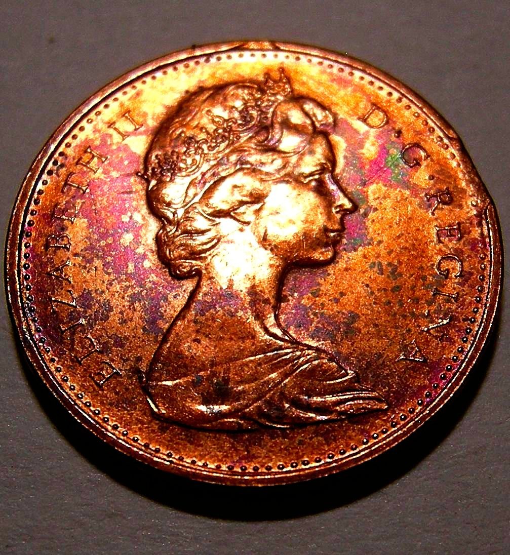 What-Could-Cause-Extreme-Shades-Of-Aqua-Blue-And-Violet-On-George-VI--Cent?