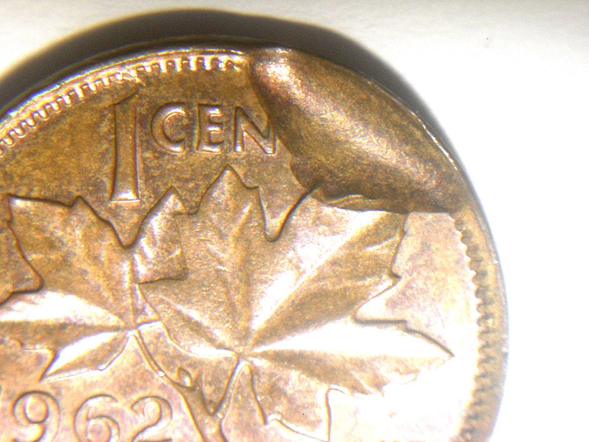 1962-Cent---Headscratcher---Struck-On-Over-Struck-Blank-?