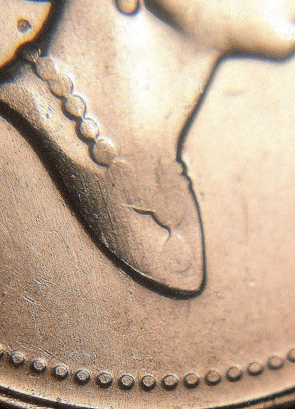 1995-10-Cents-Error---Missing-Beads-And-Jewels