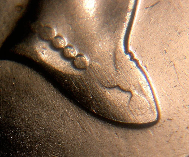 1995-10-Cents-Error---Missing-Beads-And-Jewels