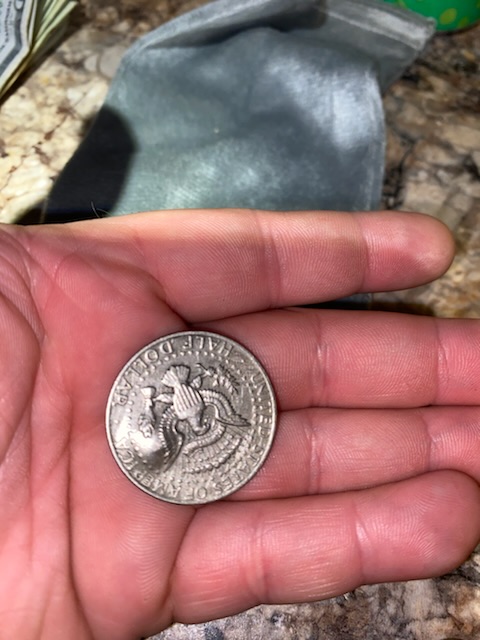 Outward-Bubble-On-1977-Kennedy-Half-Dollar-On-Both-Sides-Of-The-Coin