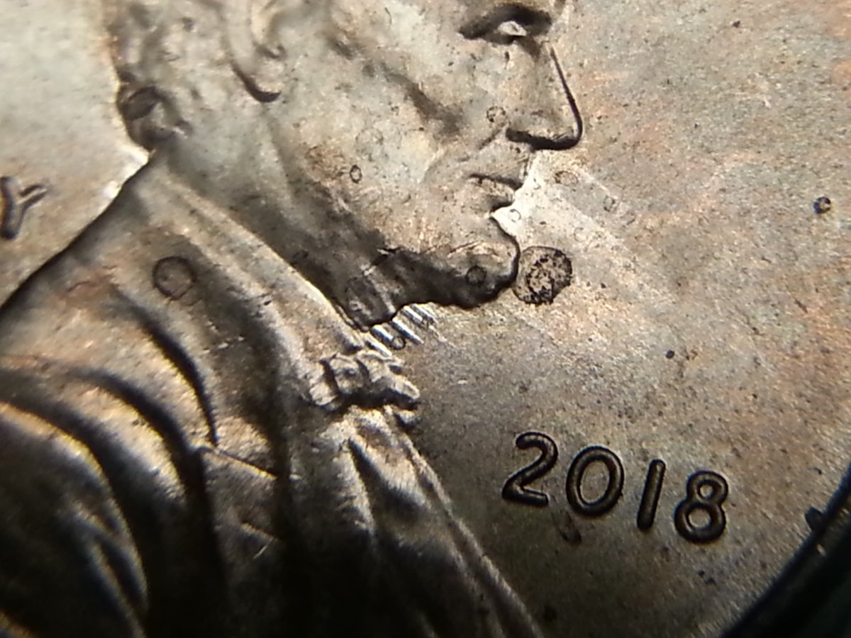 Sharp-Spikes-Into-And-Out-Of-Neck-On-2018-P-Shield-Cent?