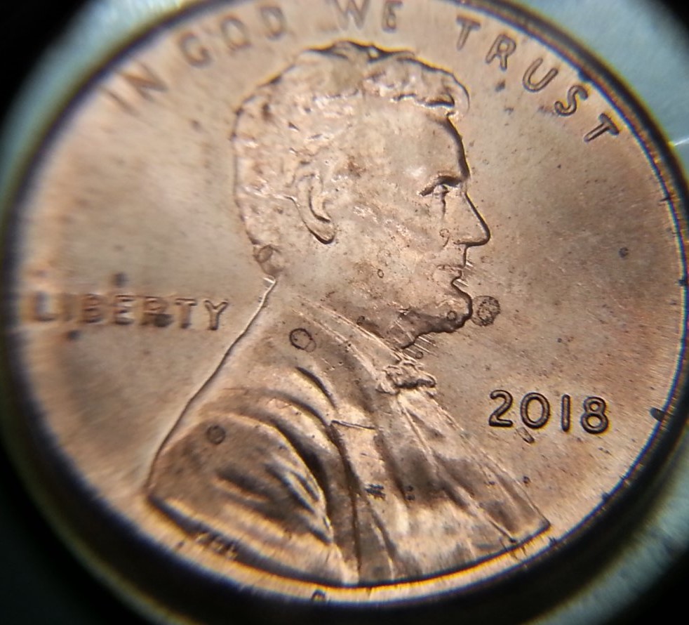 Sharp-Spikes-Into-And-Out-Of-Neck-On-2018-P-Shield-Cent?