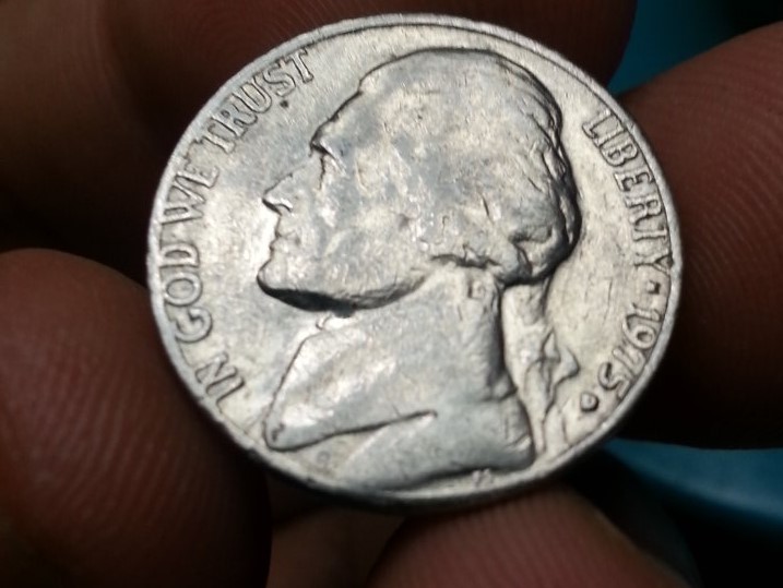 Rim-Cuds-On-1858-Flying-Eagle-Cent-And-1975-D-Nickel?