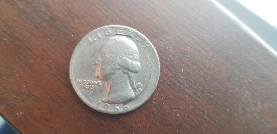 1966-Quarter-With-Indentation-On-It's-Obverse