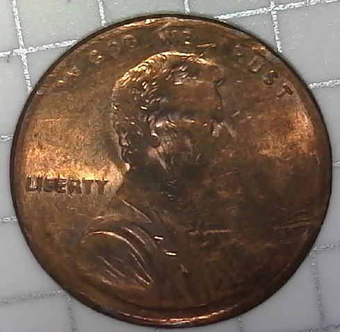Is-This-2000-Penny-Damaged-Enviromentally-Or-By-Mint