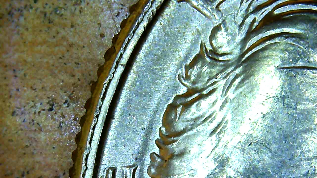 1969-Kennedy-Half-Cracked-Rim?-Doubling?-Head?