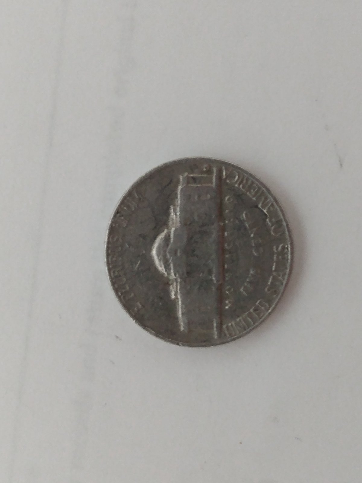 1964-D-Nickel-Has-A-Hole-In-The-Middle?