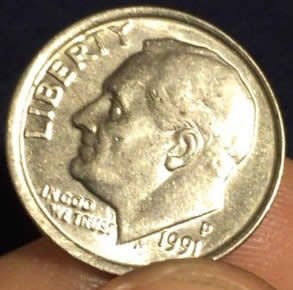 Can-Anyone-Tell-Me-Why-The-Rim-On-This-1991-Dime-Is-So-Big