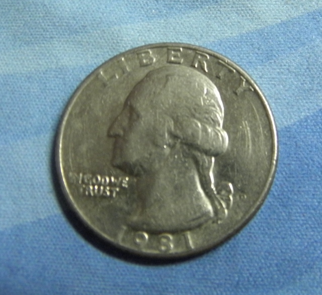 1981-Quarter-Error--Tops-Of-Liberty-Letters-Have-Extra-Punch?