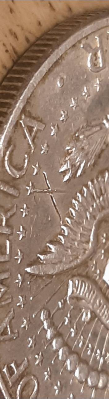 1964-Kennedy-Half-With-3-X-Shaped-Die-Crack-Marks-On-It