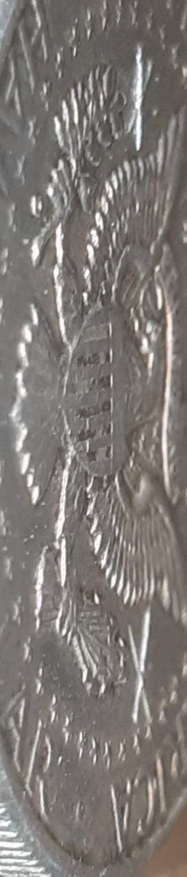 1964-Kennedy-Half-With-3-X-Shaped-Die-Crack-Marks-On-It