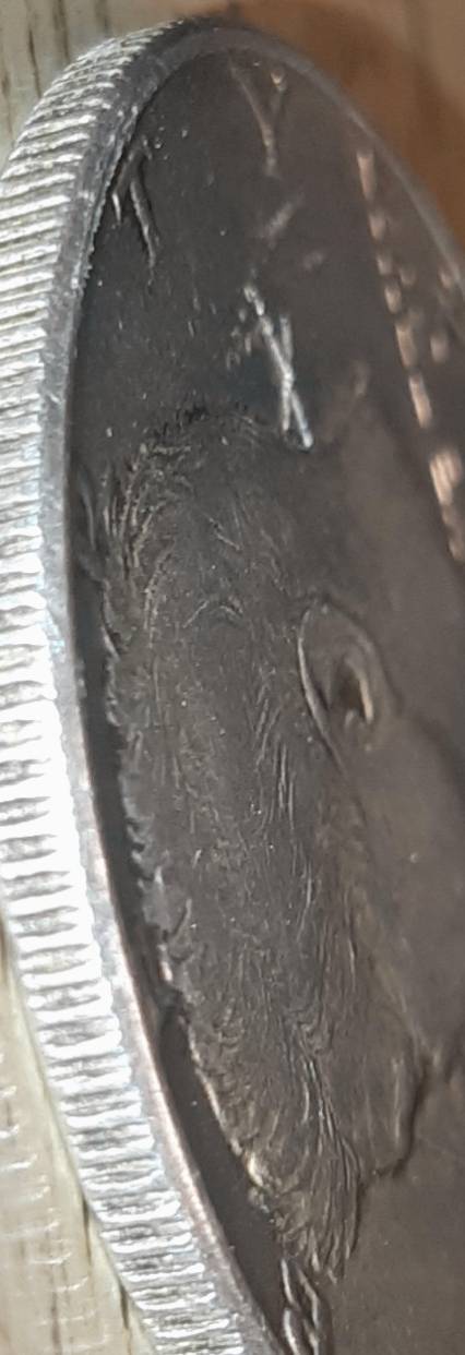 1964-Kennedy-Half-With-3-X-Shaped-Die-Crack-Marks-On-It