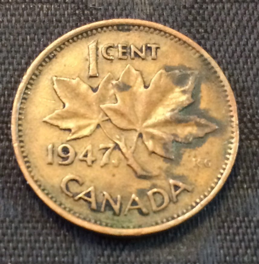 1947-Canada-Pointed-7-Maple-Leaf.-Grade-Please?