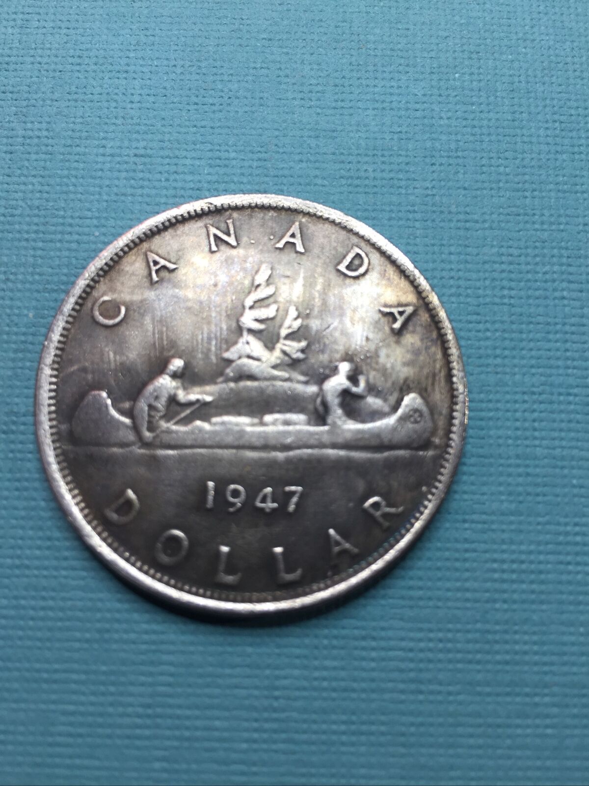 Seller-Selling-Counterfeit-1945-&-1947-Canadian-Silver-Dollars-On-Ebay