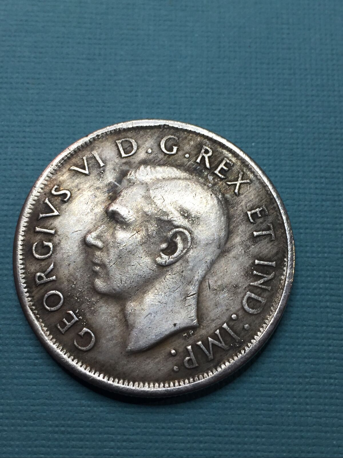 Seller-Selling-Counterfeit-1945-&-1947-Canadian-Silver-Dollars-On-Ebay