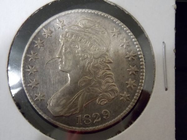 Buy-A-Book-Or-Buy-A-Coin?