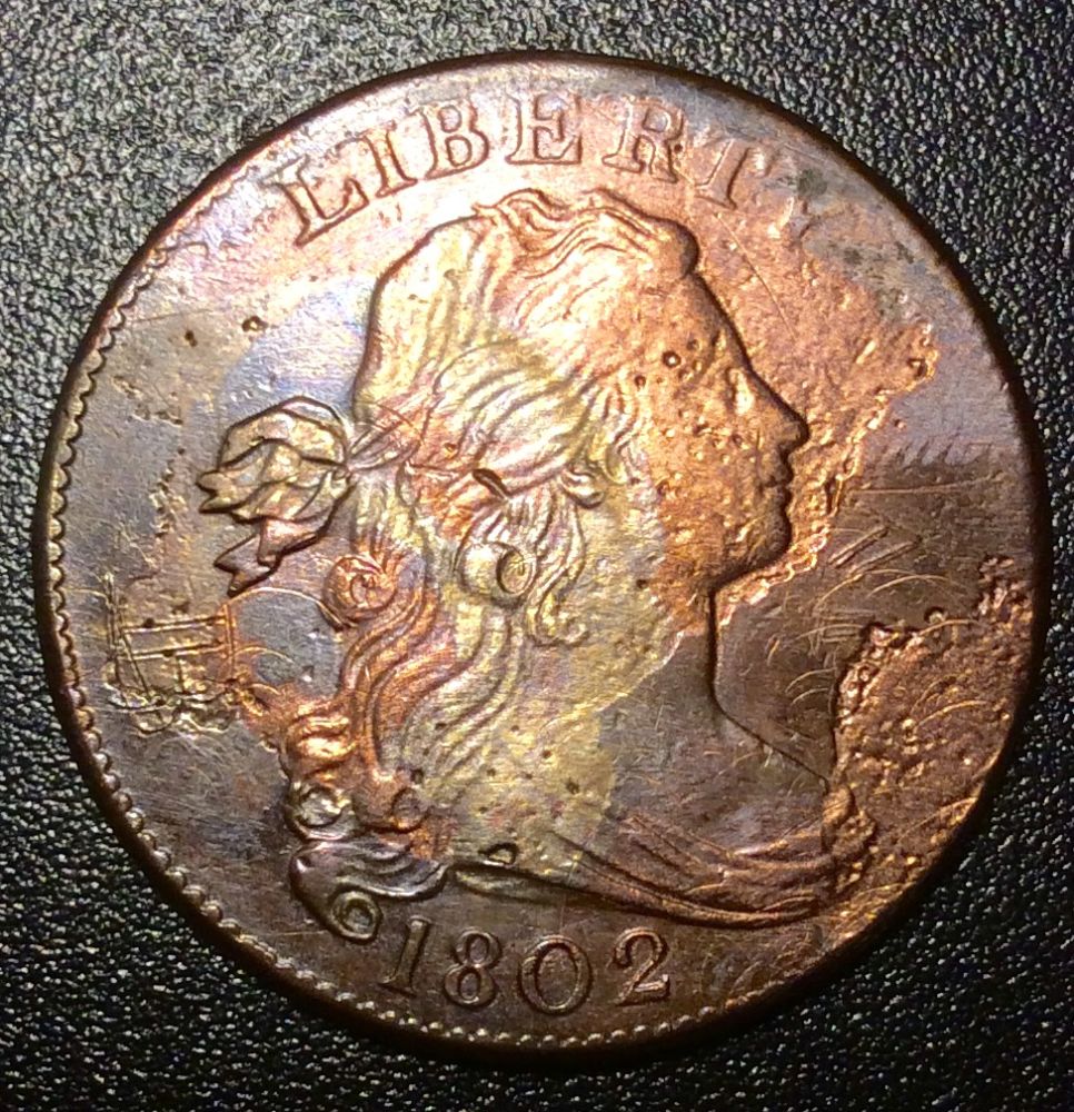 Someone-Did-A-Terrible-Thing-To-These-2-Coins.