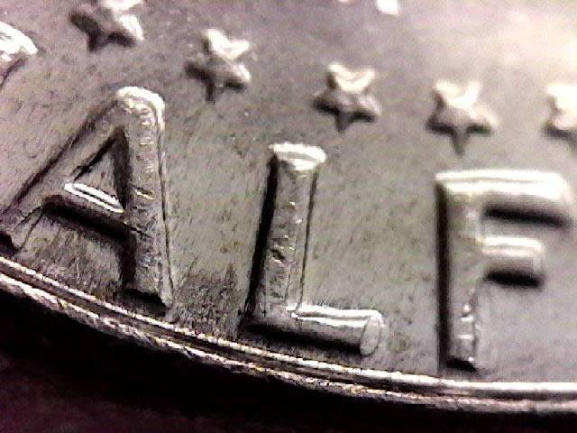 1969-D-Business-Strike-Kennedy-Half---Straight-G-Vs.-Flared-G