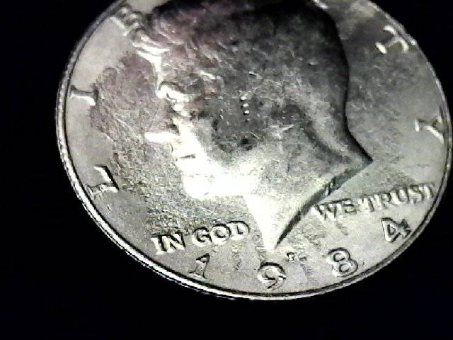 Two-1984-P-Kennedy-Halves-Remarkably-Similar