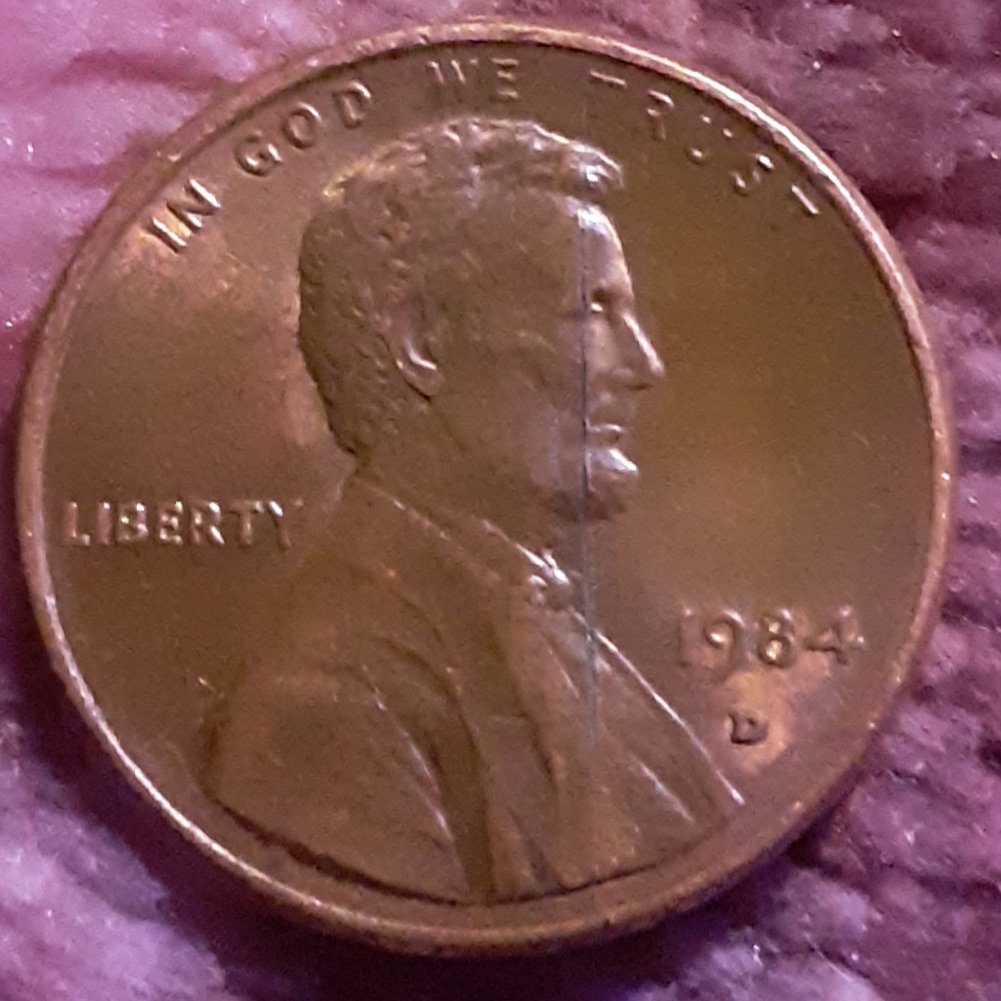 1984-D-Penny-May-Be-Struck-Through?-Your-Opinion?-Thanks!