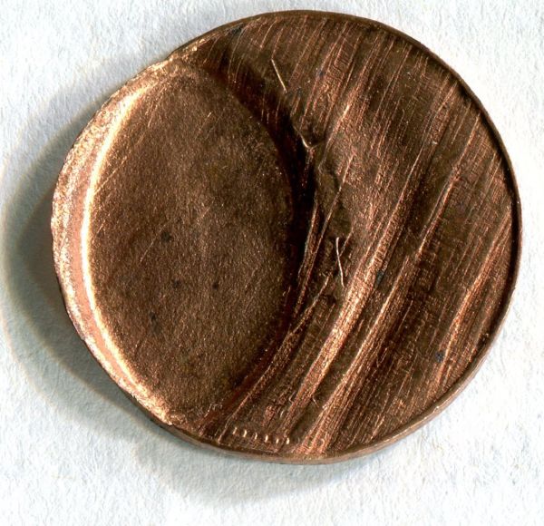 Cent-Weakly-Struck-By-Tilted-Die;-Multiple-Brockages