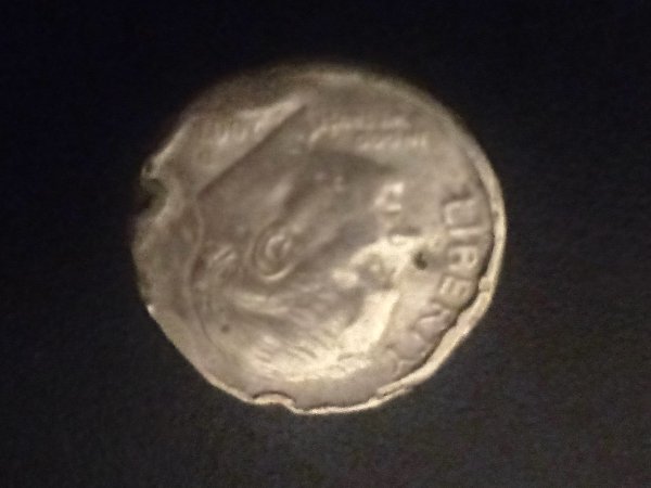 2007-Denver-Mint-Dime-With-Some-Sort-Of-High-Heat-Damage-And-Putting?