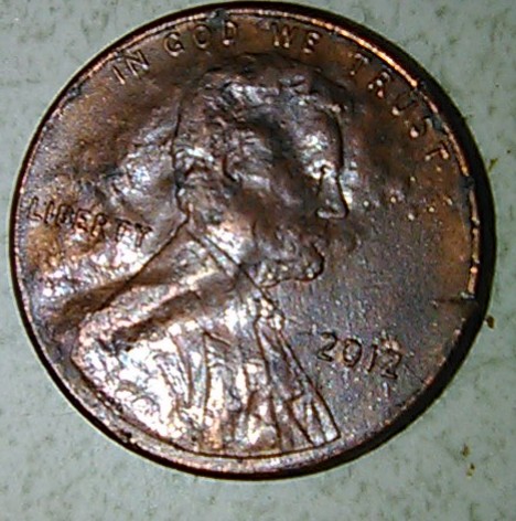 Can-Someone-Tell-Me-What-Is-Up-With-This-2012-P-Shield-Penny-Please?
