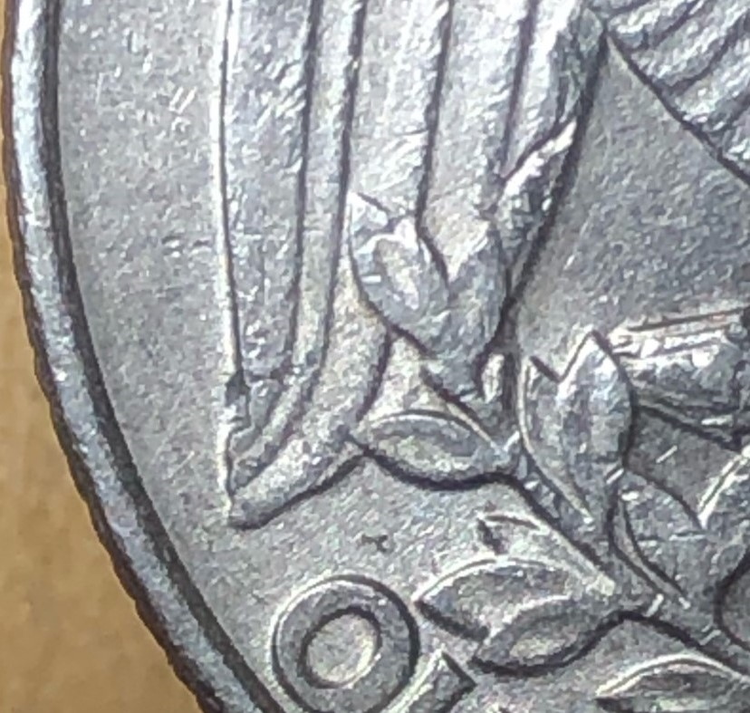 1989-D-Quarter-Left-Wing-Different?