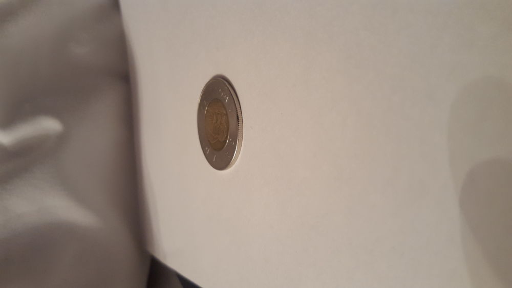 Toonie-Mint-Error-Or-Crushed-By-An-Anvil?