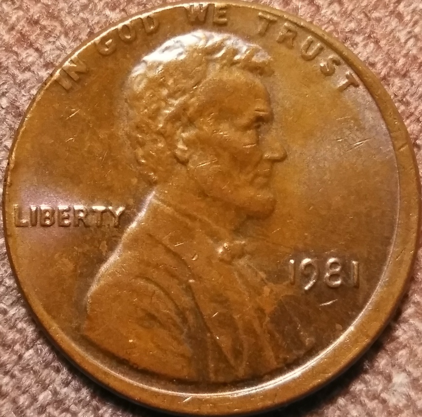 Couple-Coins-That-Are-Misaligned-Off-Center-Strike