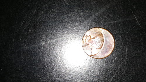 Off-Center-Strike-1983-Penny