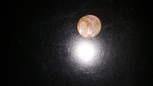 Off-Center-Strike-1983-Penny