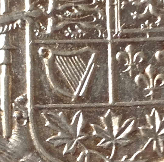 Can-You-Spot-The-Die-Chip-On-This-1955-Fifty-Cent-Piece?