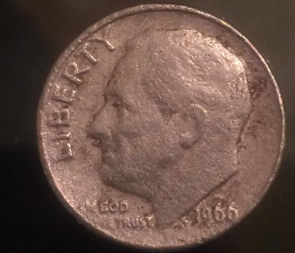 Mint-Damaged-Or-A-Parking-Lot-Dime?