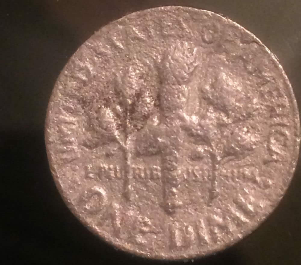 Mint-Damaged-Or-A-Parking-Lot-Dime?