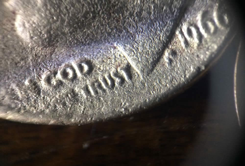 Mint-Damaged-Or-A-Parking-Lot-Dime?