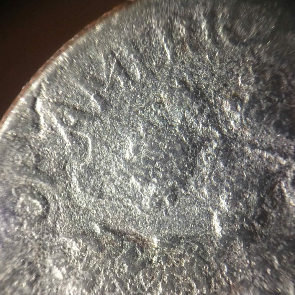 Mint-Damaged-Or-A-Parking-Lot-Dime?