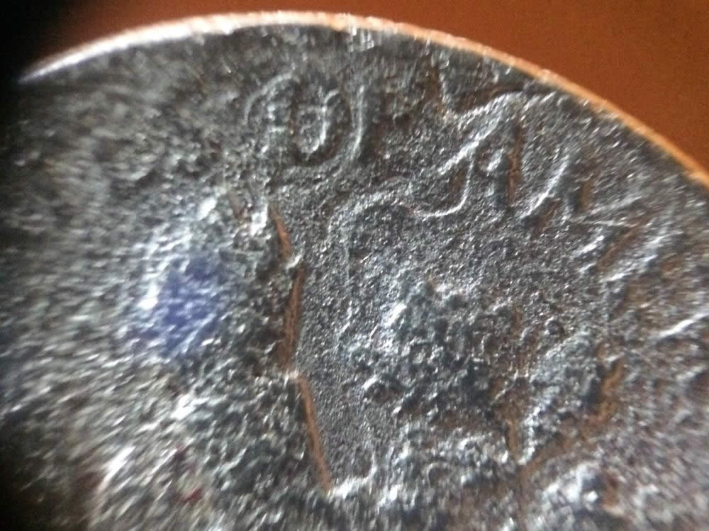 Mint-Damaged-Or-A-Parking-Lot-Dime?