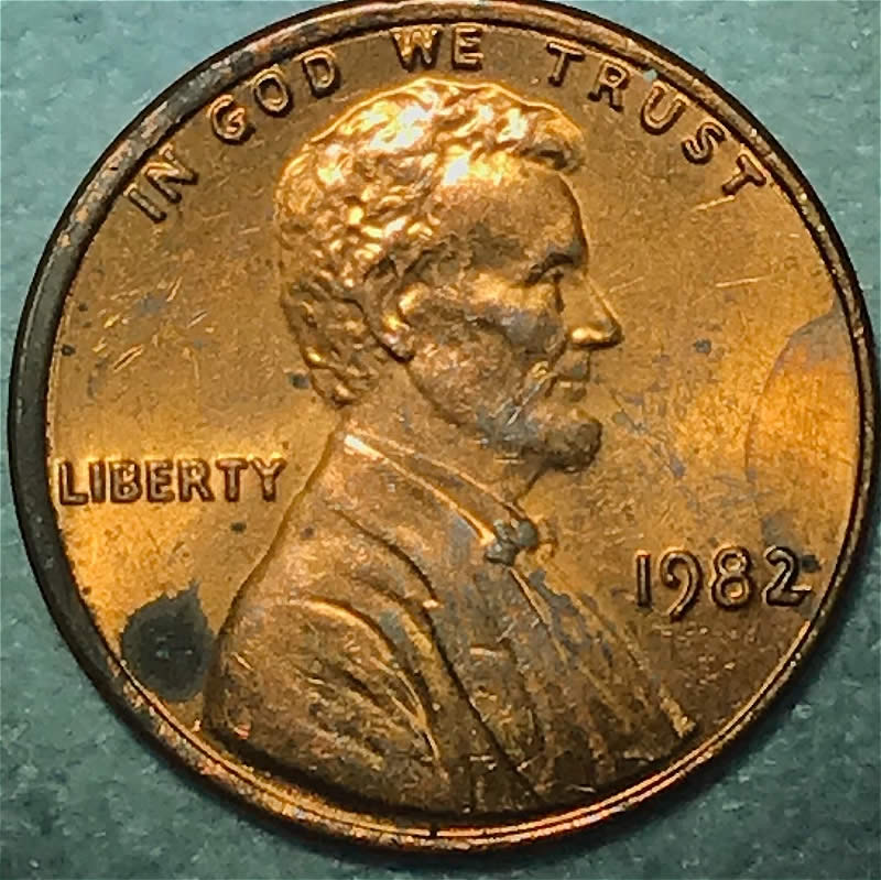 1982-P-Cent-With-Odd-Die-Scratches.-Lathe-Lines?