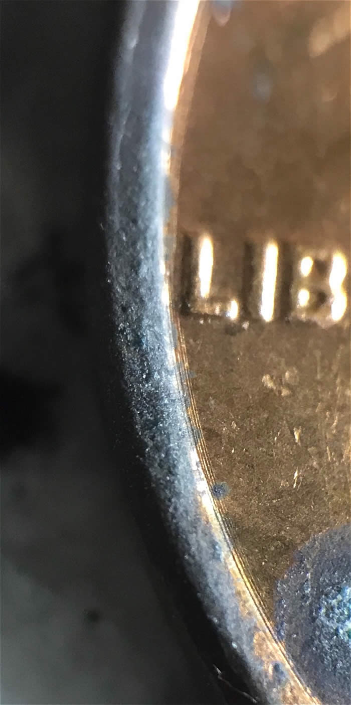 1982-P-Cent-With-Odd-Die-Scratches.-Lathe-Lines?