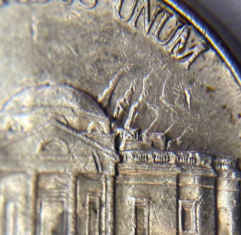 No-Date-Jefferson-Nickel-Struck-Through-Capped-Die-With-Atypical-Clashed-Dies