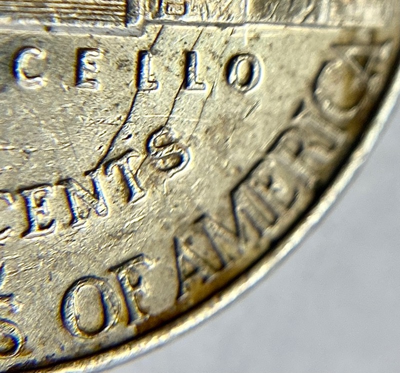 No-Date-Jefferson-Nickel-Struck-Through-Capped-Die-With-Atypical-Clashed-Dies