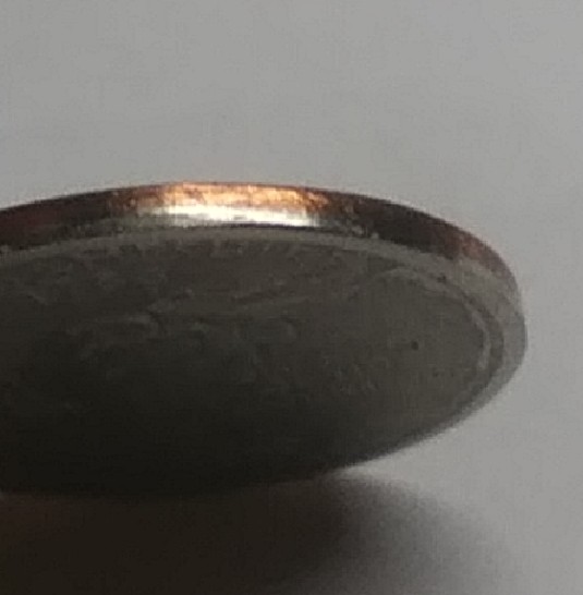 2000-New-Hampshire-Quarter-Error-Or-Damage?