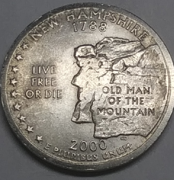 2000-New-Hampshire-Quarter-Error-Or-Damage?