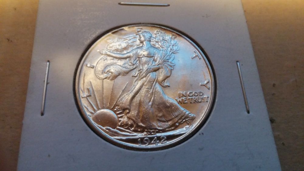 Damage-On-1942-Half-Grade