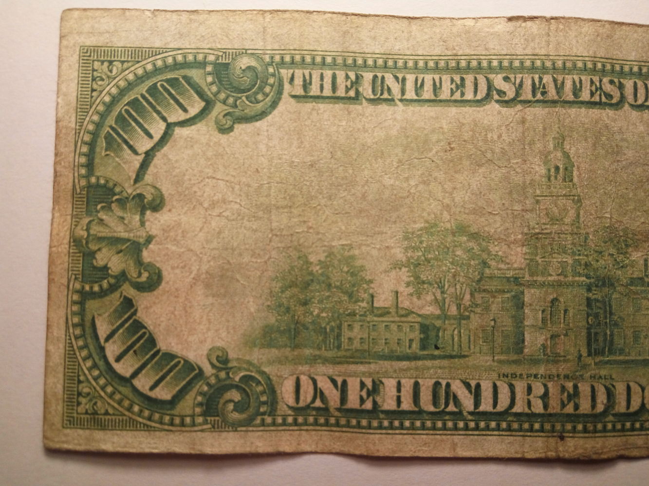Valuation-$100-1928-Gold