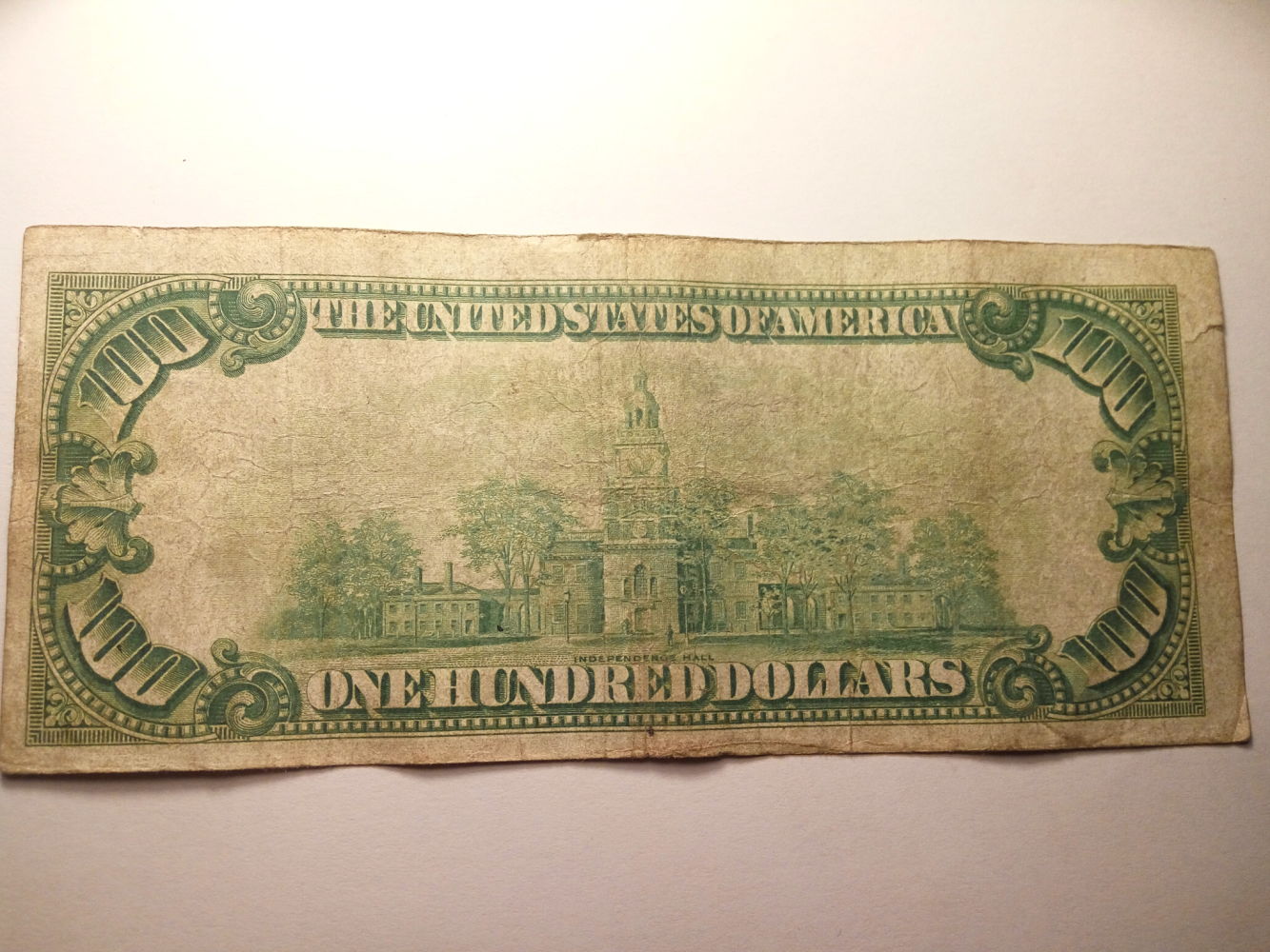 Valuation-$100-1928-Gold