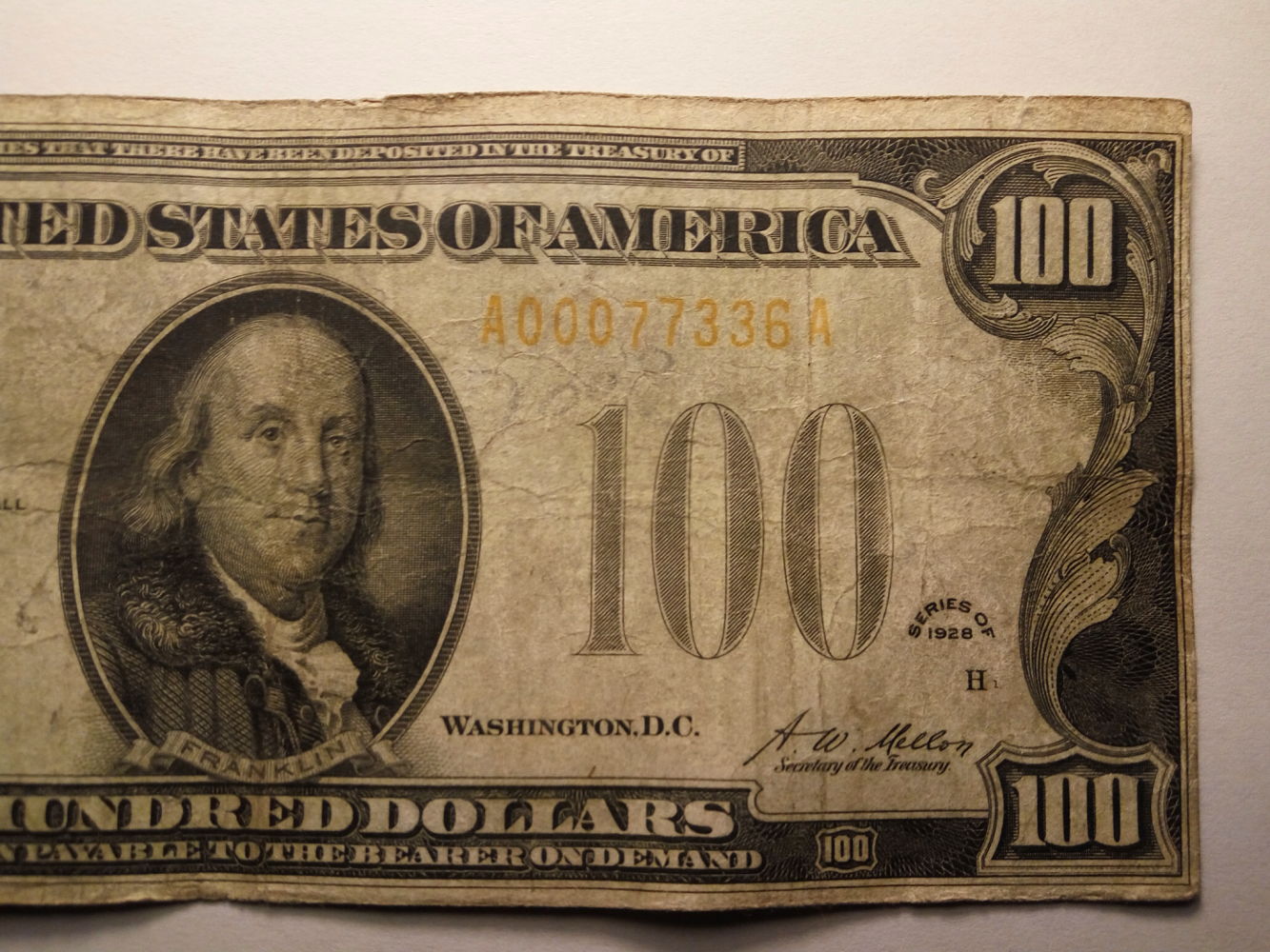 Valuation-$100-1928-Gold